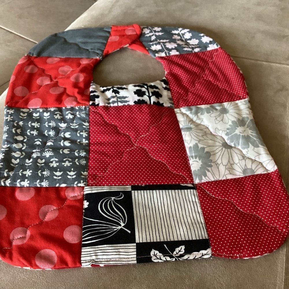 NWT , quilted reversible, handcrafted, baby bib reds